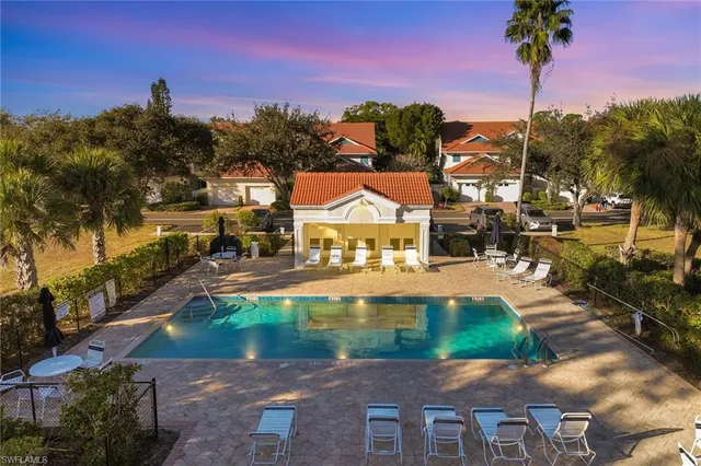 a view of a street with a building in the background
