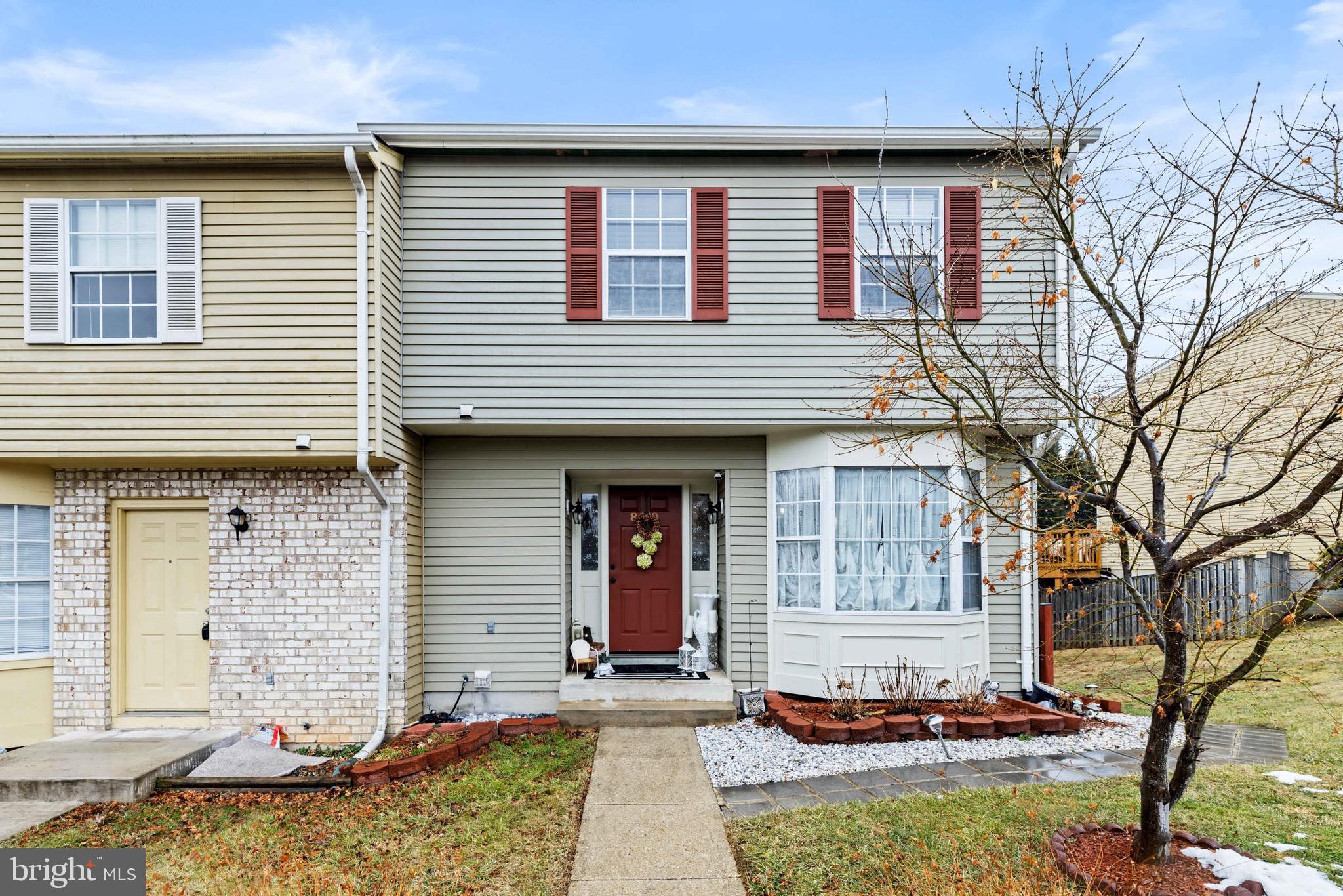 8610 Kelso Terrace Gaithersburg, MD 20877 - Photo 1 of 33 a front view of a house with a tree