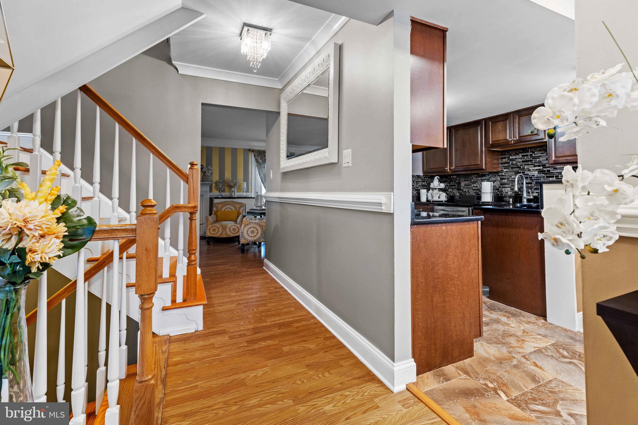8610 Kelso Terrace Gaithersburg, MD 20877 - Photo 2 of 33 a view of living room with furniture and wooden floor
