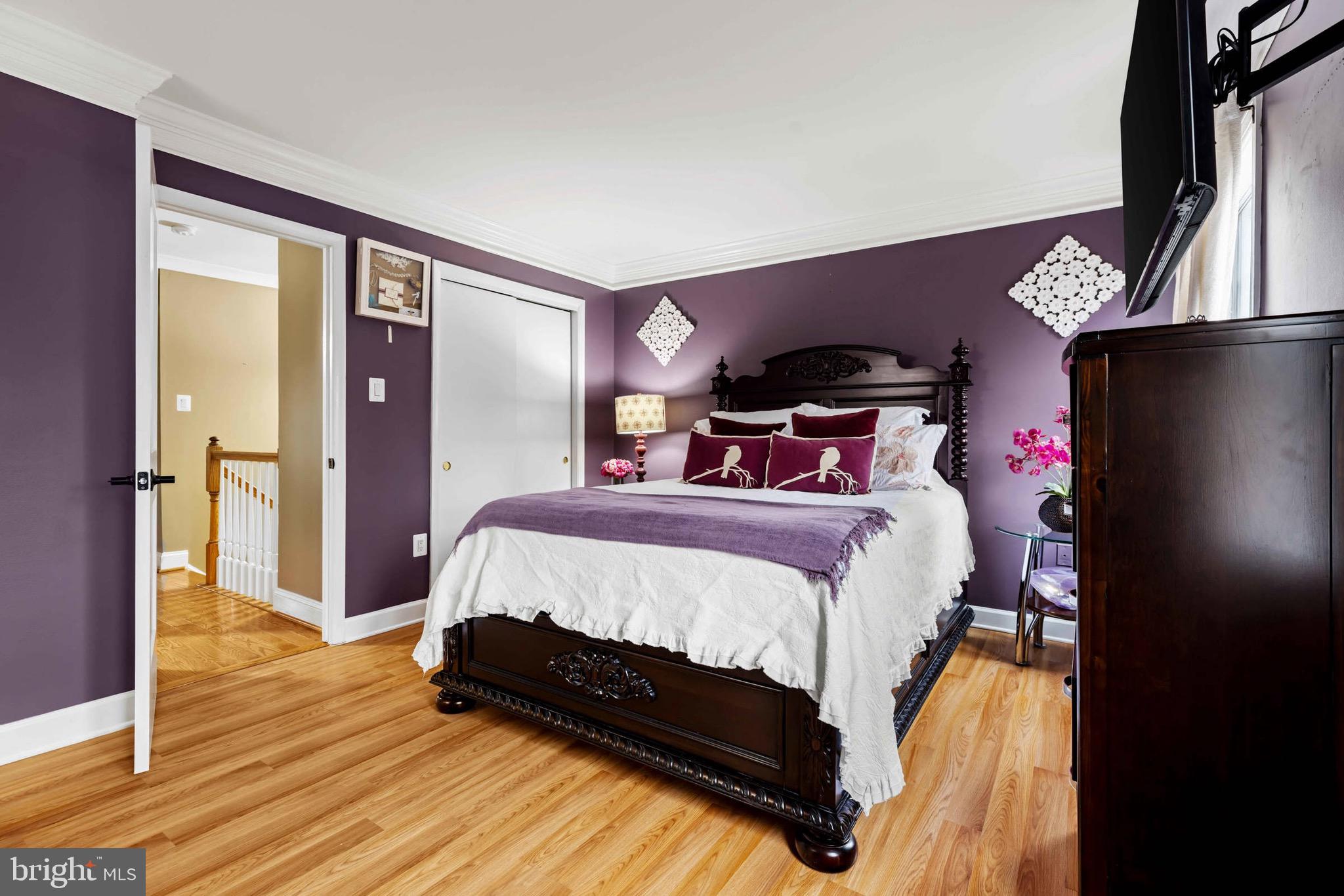 8610 Kelso Terrace Gaithersburg, MD 20877 - Photo 23 of 33 a bed sitting in a bedroom next to a window