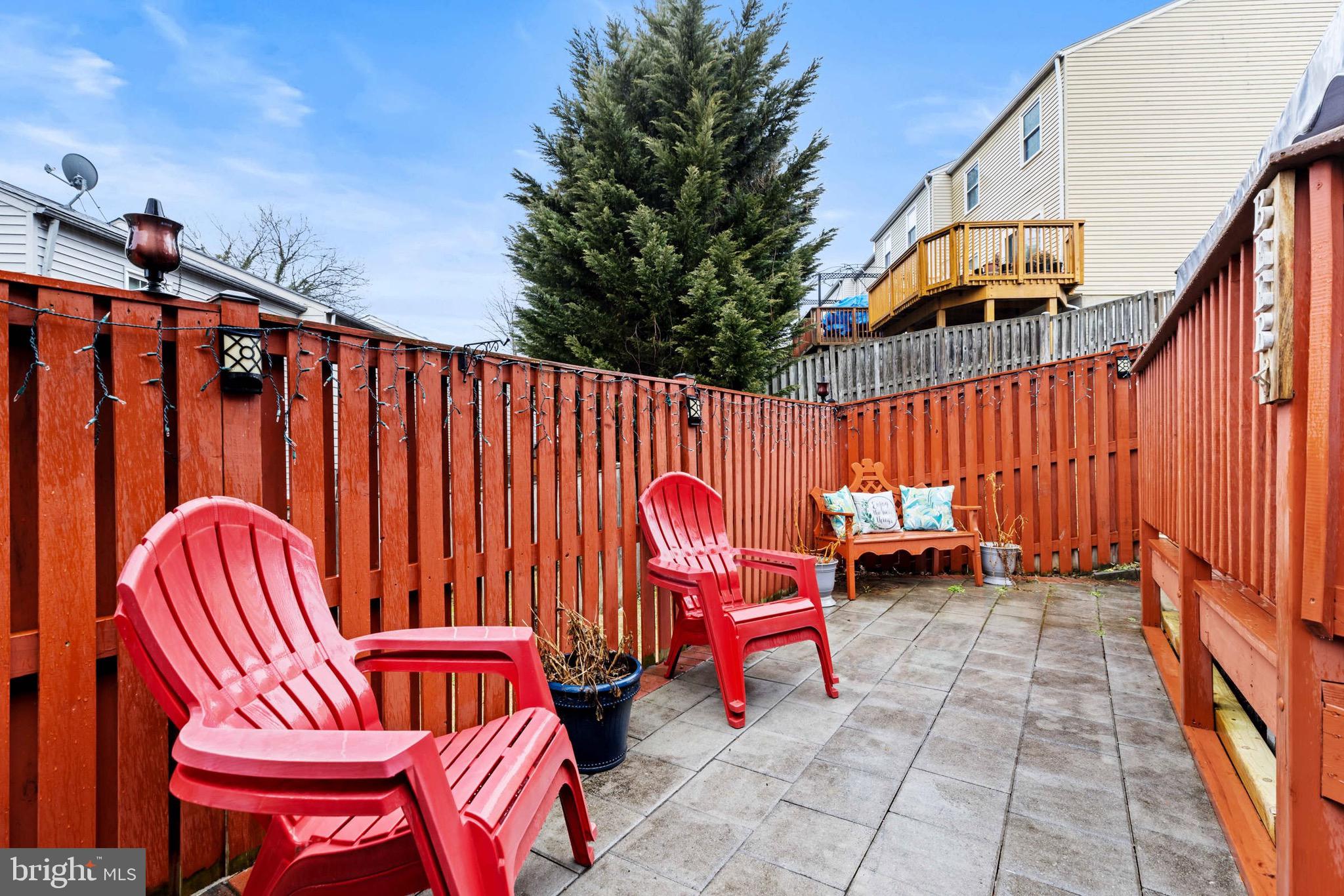 8610 Kelso Terrace Gaithersburg, MD 20877 - Photo 26 of 33 an outdoor sitting area with chairs and couch