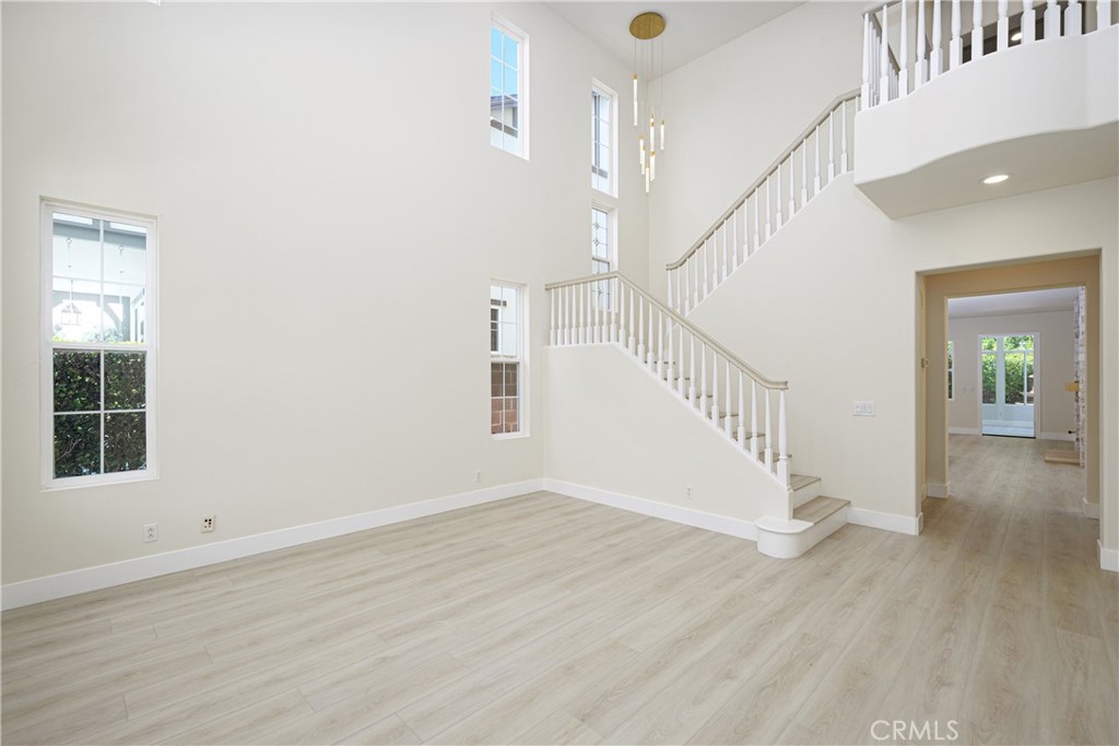 15 Plum Street Ladera Ranch, CA 92694 - Photo 17 of 113 a view of empty room with wooden floor and fan