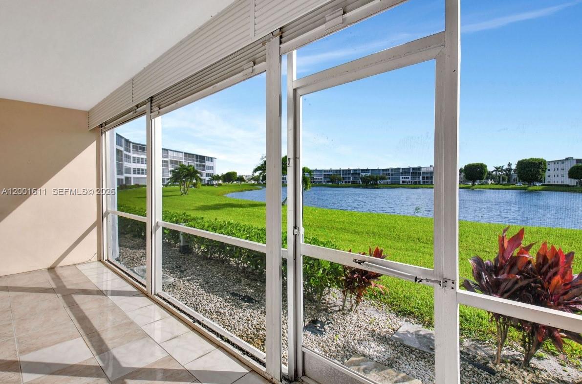 1020 Exeter, Unit 1020 Boca Raton, FL 33434 - Photo 6 of 15 a view of a balcony with lake view