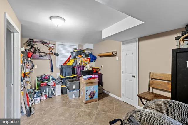 a view of play room with toys and air hockey table