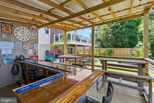 a view of a chairs and table in the patio