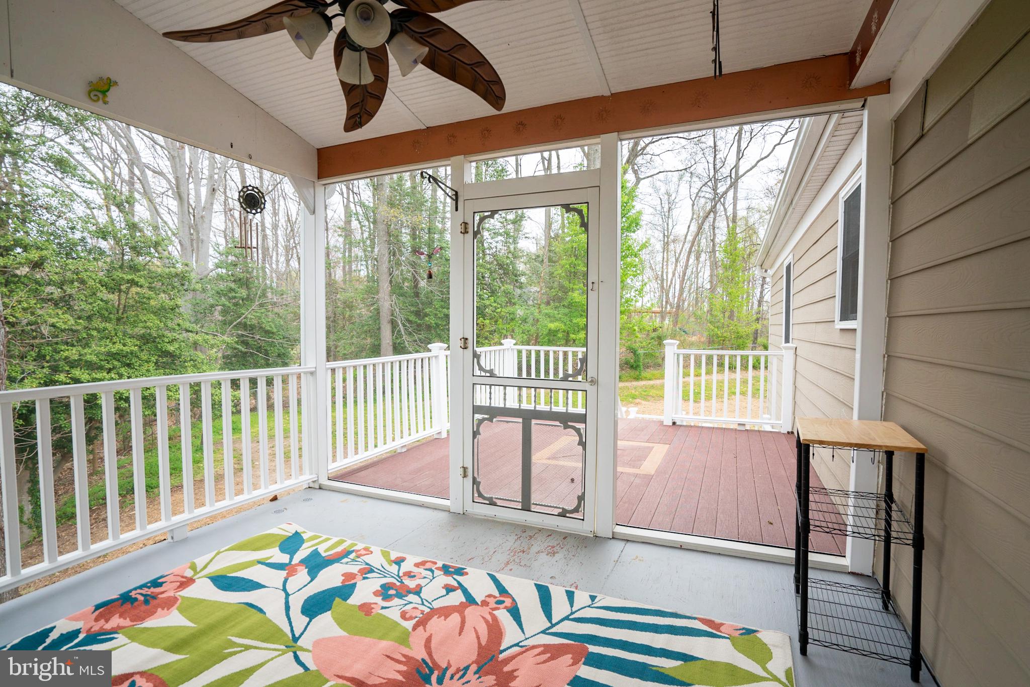 1951 Watson Road Owings, MD 20736 - Photo 11 of 31 Screened In Porch leading to the deck