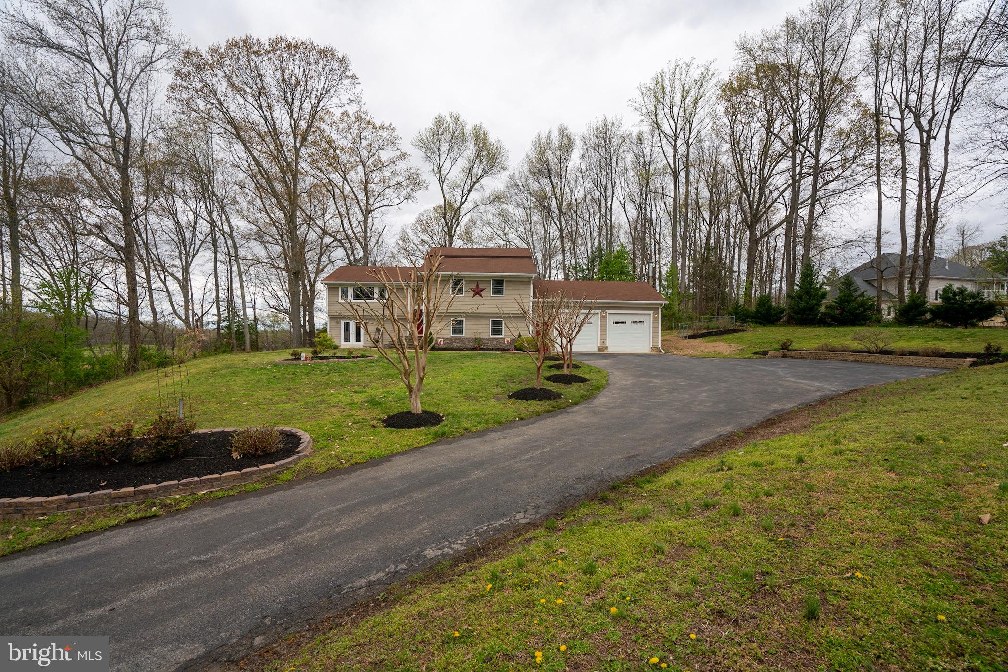 1951 Watson Road Owings, MD 20736 - Photo 4 of 31 Plenty of parking with , 2 car garage and drive wa