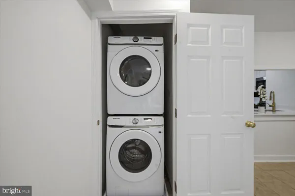 a utility room with dryer and washer