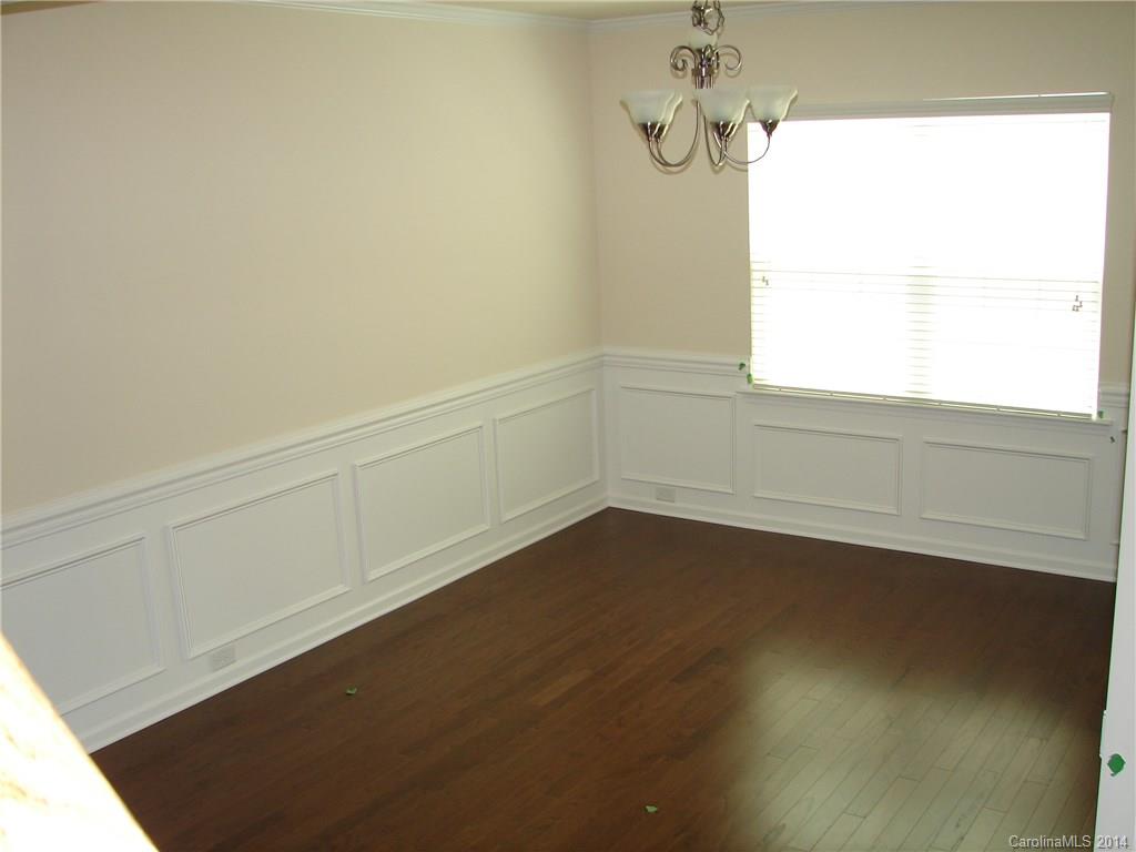 4316 Perth Road, Unit 290 Indian Land, SC 29707 - Photo 4 of 11 a view of a room with wooden floor and fan