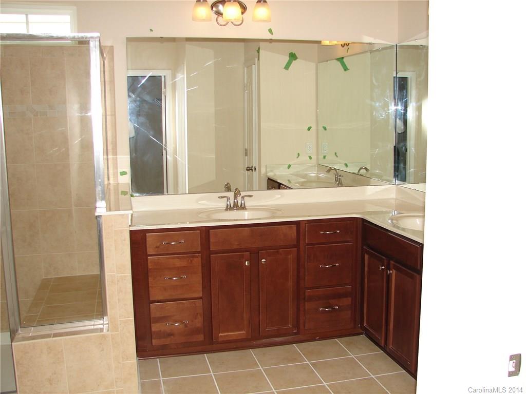 4316 Perth Road, Unit 290 Indian Land, SC 29707 - Photo 9 of 11 a bathroom with a sink and a mirror