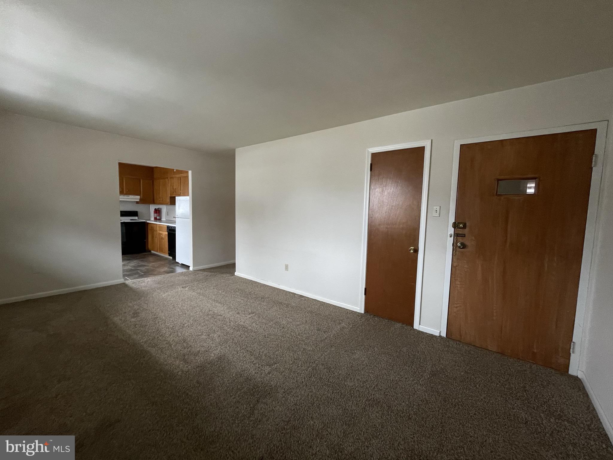 6 Orchard Hills Drive, Unit B Boyertown, PA 19512 - Photo 6 of 8 a view of empty room with furniture and wooden floor