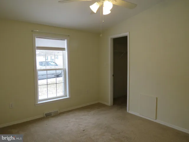 an empty room with a window