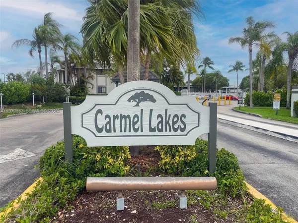 a sign on the side of the road