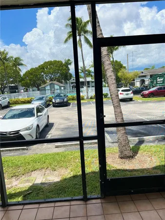 a view of swimming pool from a window