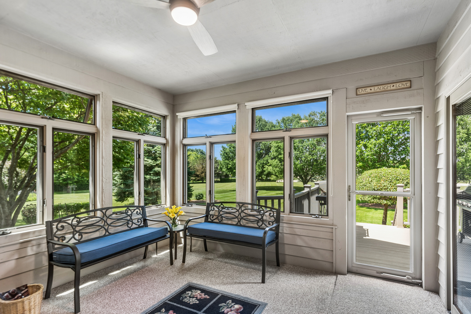 10907 Red Hawk Lane Spring Grove, IL 60071 - Photo 16 of 44 a living room with furniture and a large window