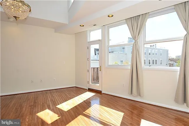 a view of an empty room and window