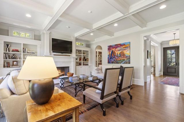 a spacious bathroom with a tub shower and sink