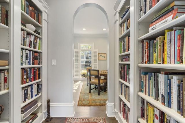 a view of a storage and utility room with washer and dryer