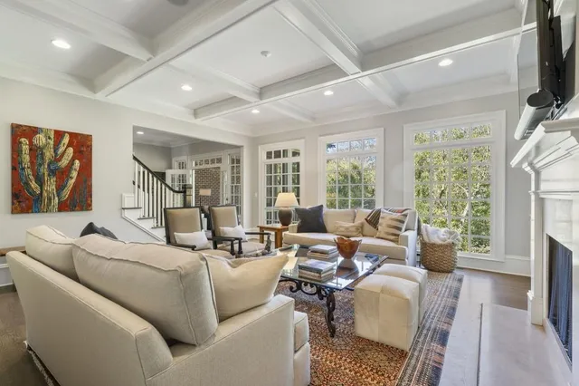 a bedroom with a bed and a chair