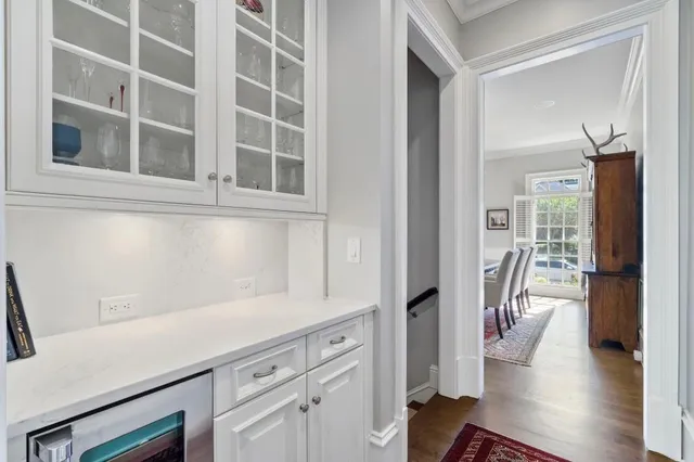 a kitchen with stainless steel appliances granite countertop a sink and a stove