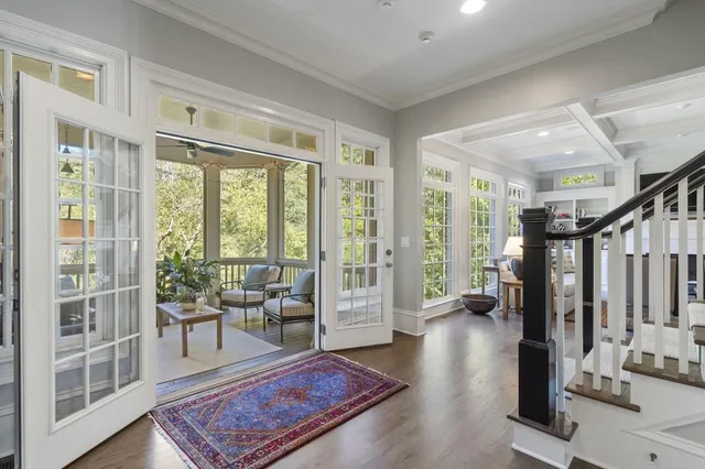 a living room with furniture and a table