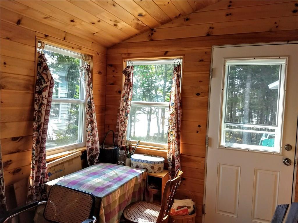 87 Wards Cove Road Harrington, ME 04643 - Photo 14 of 21 Sunroom with views and exit to deck