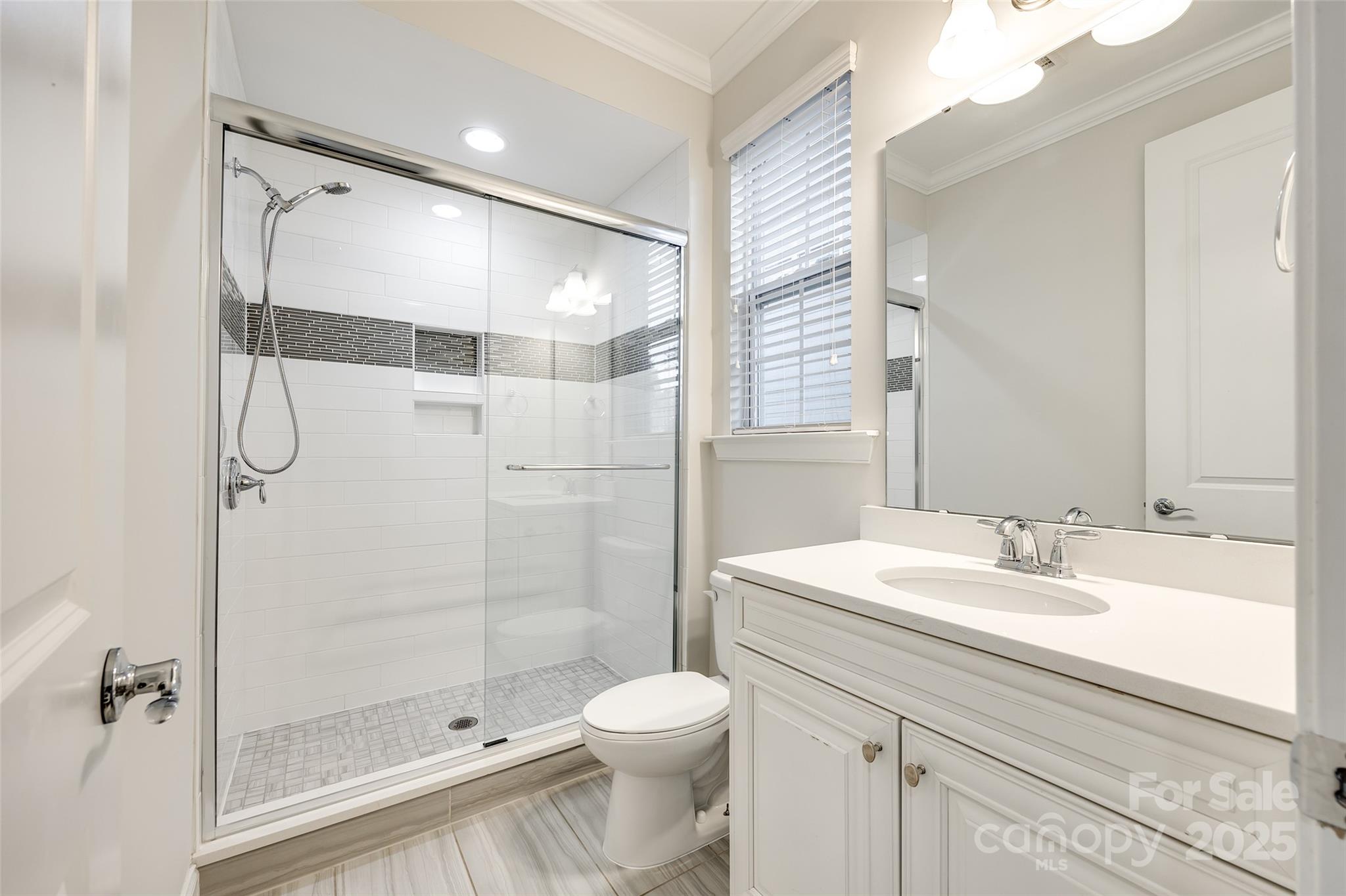 1056 Emory Lane Fort Mill, SC 29708 - Photo 17 of 48 a bathroom with a sink toilet and shower
