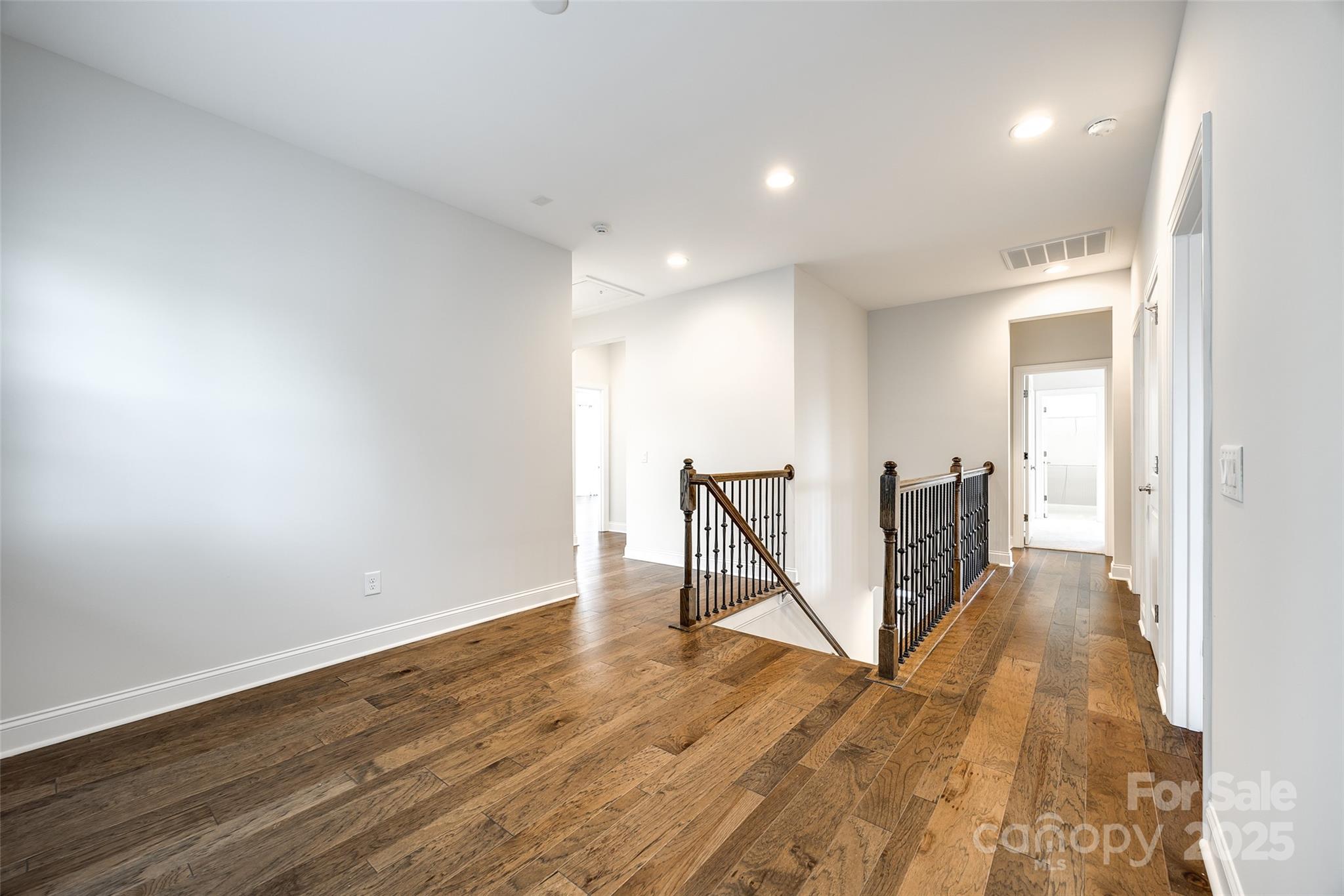 1056 Emory Lane Fort Mill, SC 29708 - Photo 18 of 48 a view of a room with wooden floor