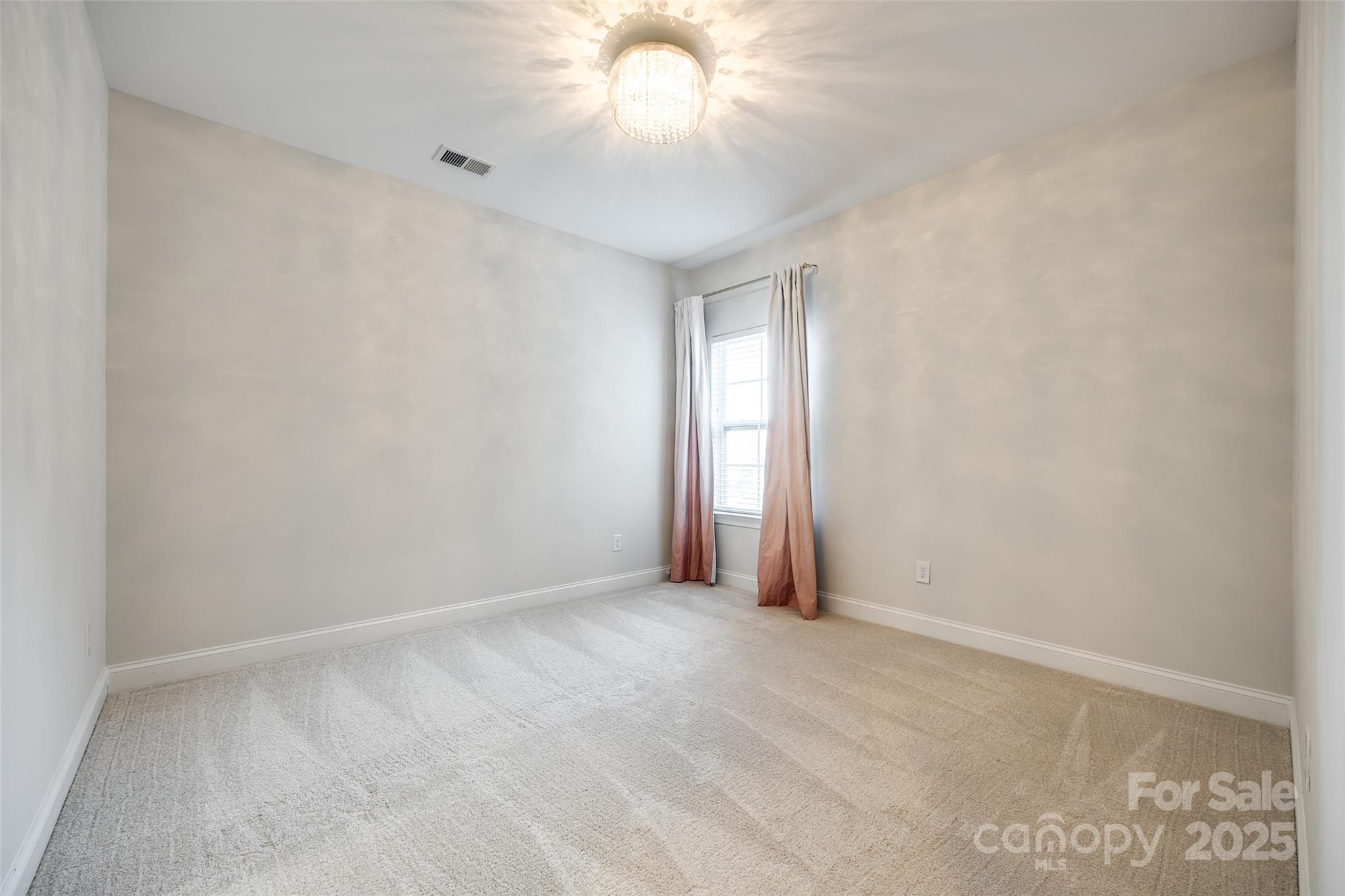 1056 Emory Lane Fort Mill, SC 29708 - Photo 26 of 48 a view of an empty room and window