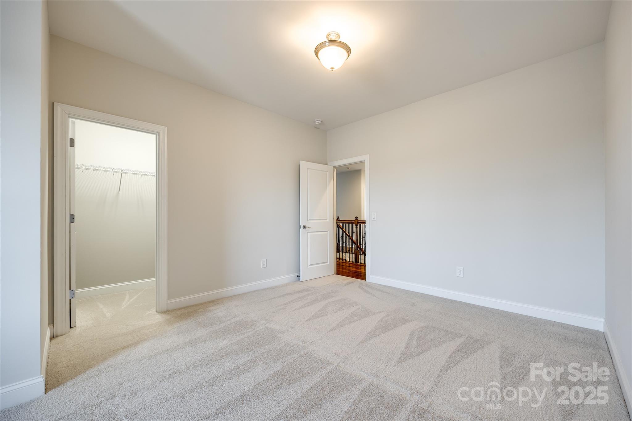 1056 Emory Lane Fort Mill, SC 29708 - Photo 29 of 48 a view of empty room with wooden floor