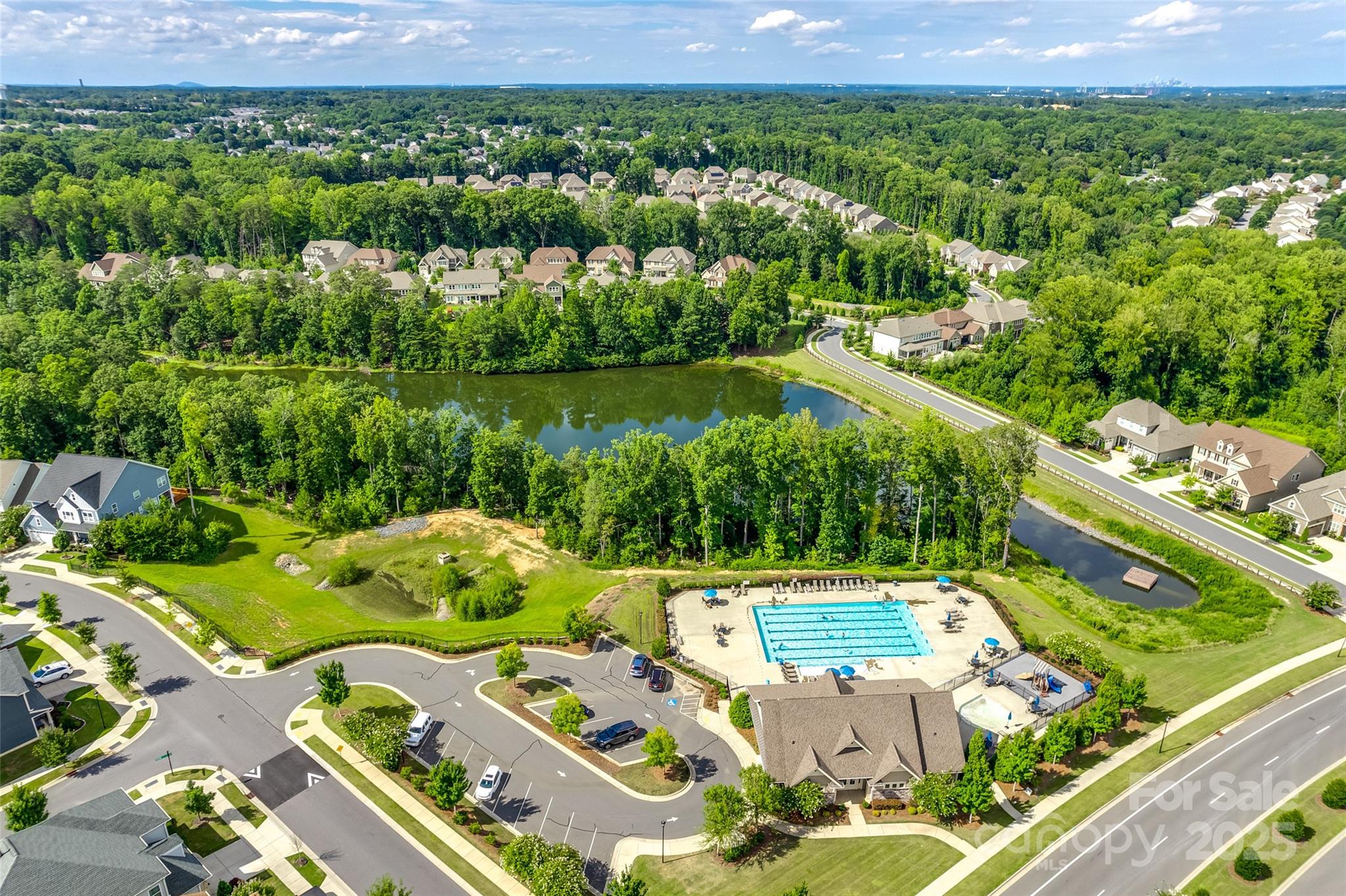 1056 Emory Lane Fort Mill, SC 29708 - Photo 44 of 48 an aerial view of a residential houses with outdoor space and lake view