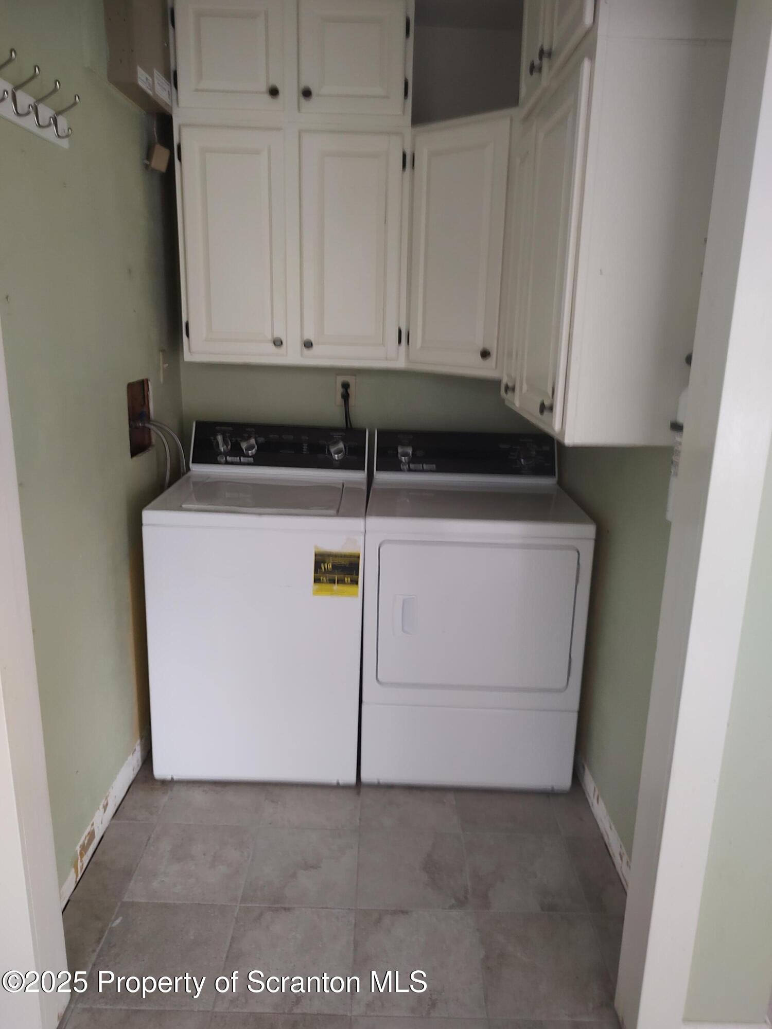 215 West Grove Street Clarks Summit, PA 18411 - Photo 17 of 26 a utility room with dryer and washer
