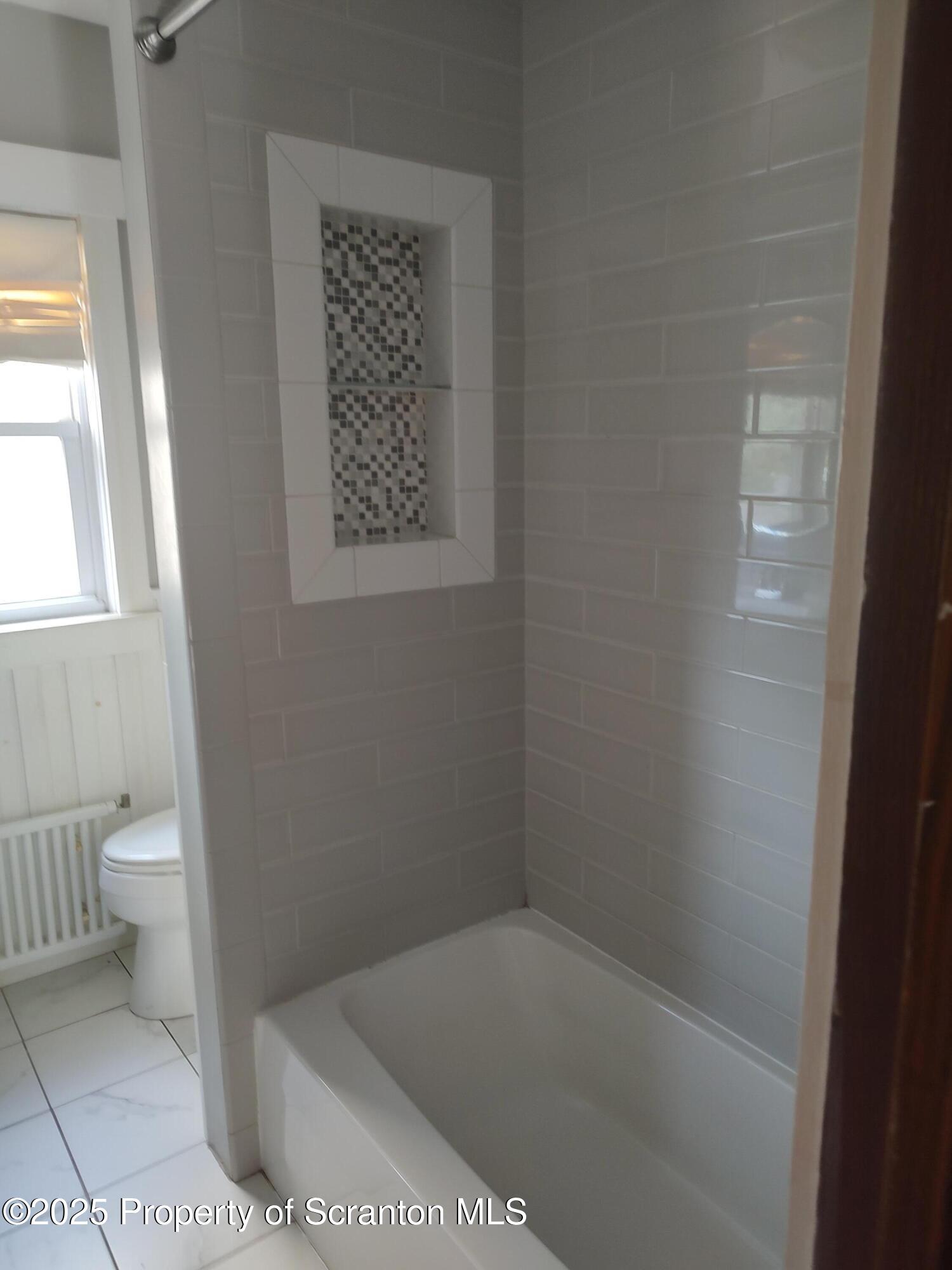 215 West Grove Street Clarks Summit, PA 18411 - Photo 22 of 26 a bath room with a toilet