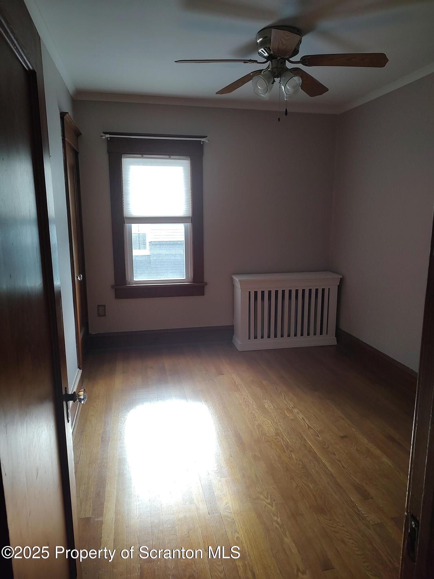 215 West Grove Street Clarks Summit, PA 18411 - Photo 26 of 26 a view of hallway with window and a ceiling fan