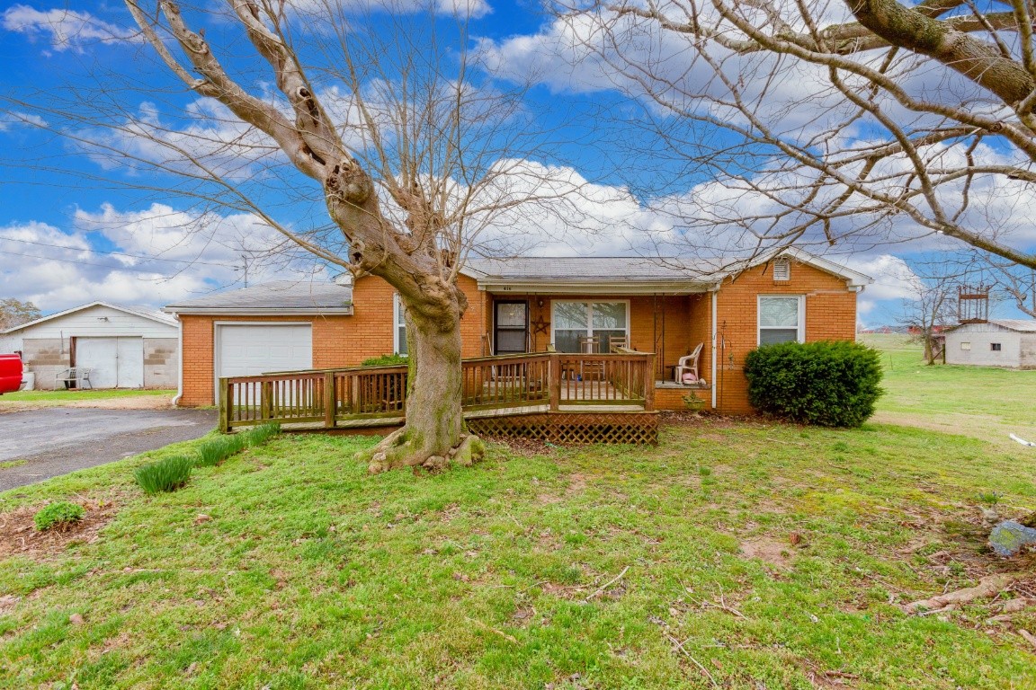 416 Keysburg Road Adams, TN 37010 - Photo 1 of 27 a view of a house with a yard