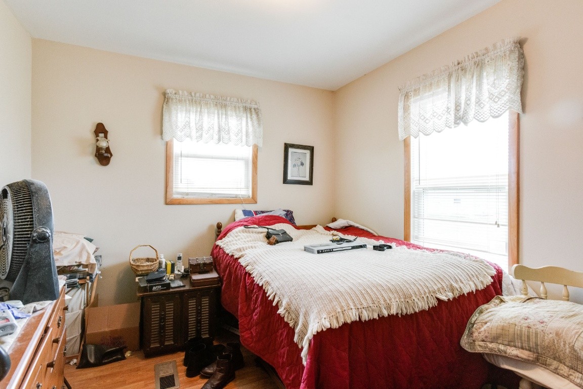 416 Keysburg Road Adams, TN 37010 - Photo 14 of 27 a bedroom with a bed and a window
