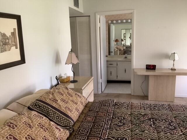 4855 Northwest 2nd Street, Unit D Delray Beach, FL 33445 - Photo 10 of 14 Master Bedroom bath