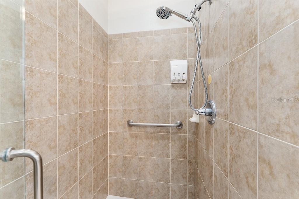 19115 Southwest 98th Loop Dunnellon, FL 34432 - Photo 22 of 36 a bathroom with a shower