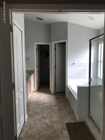 a view of a hallway with elevator