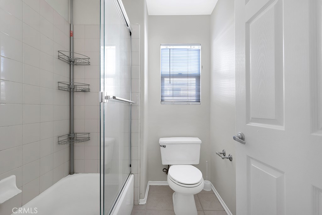 11205 Salerno Porter Ranch Porter Ranch, CA 91326 - Photo 34 of 43 a white toilet sitting next to a bath tub