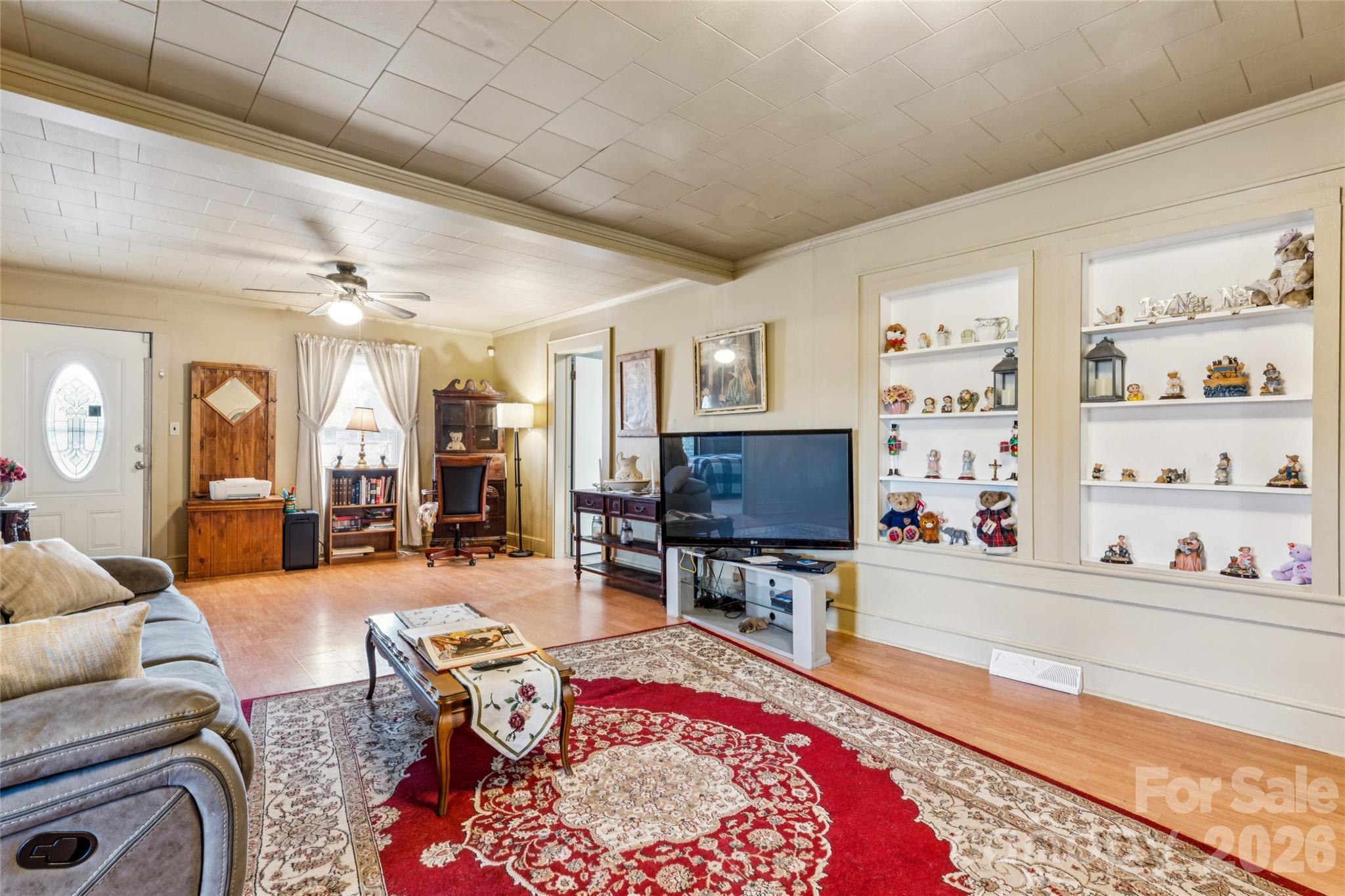 7910 Highway 90 Stony Point, NC 28678 - Photo 3 of 28 a living room with furniture and a flat screen tv