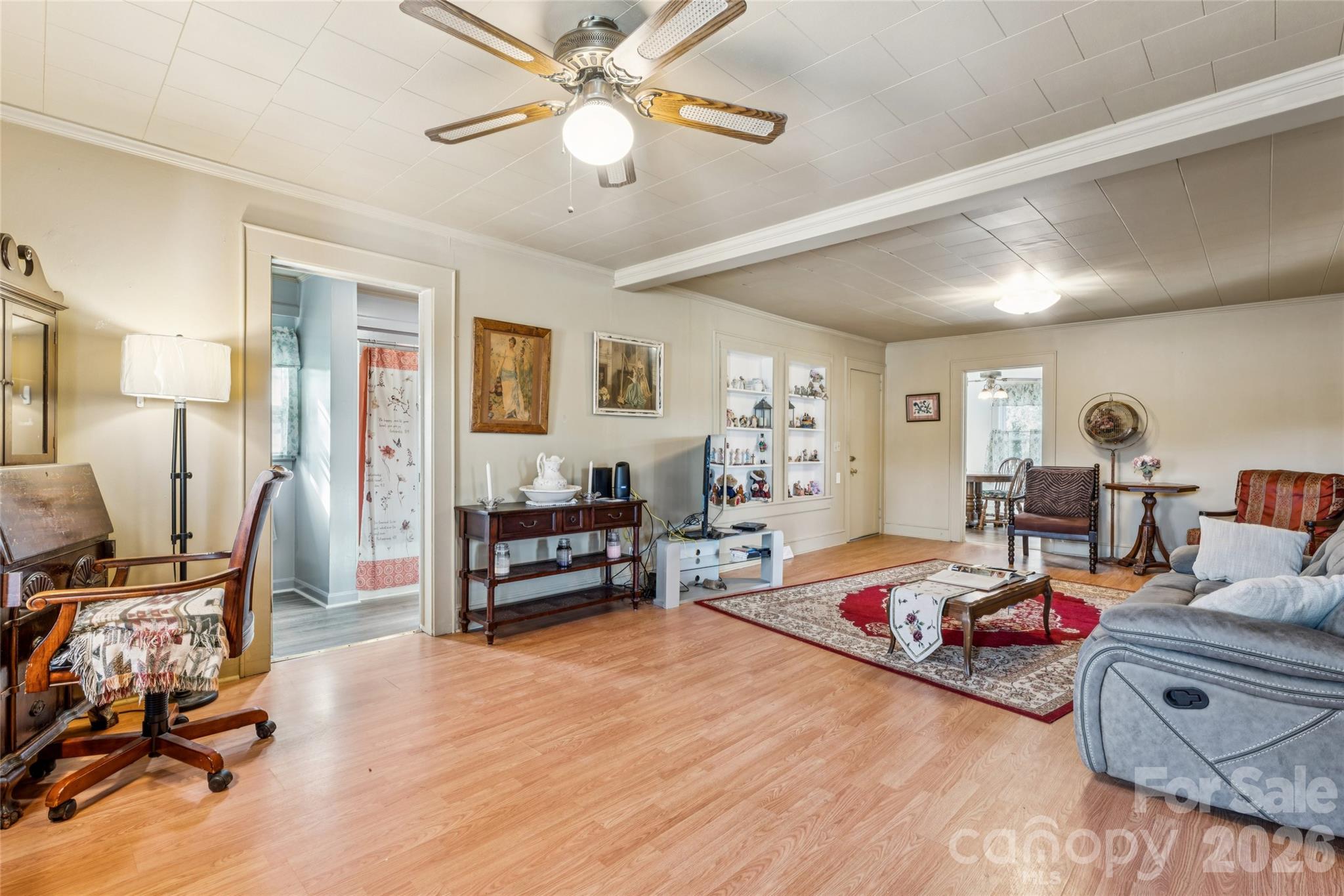 7910 Highway 90 Stony Point, NC 28678 - Photo 6 of 28 a bedroom with furniture and wooden floor