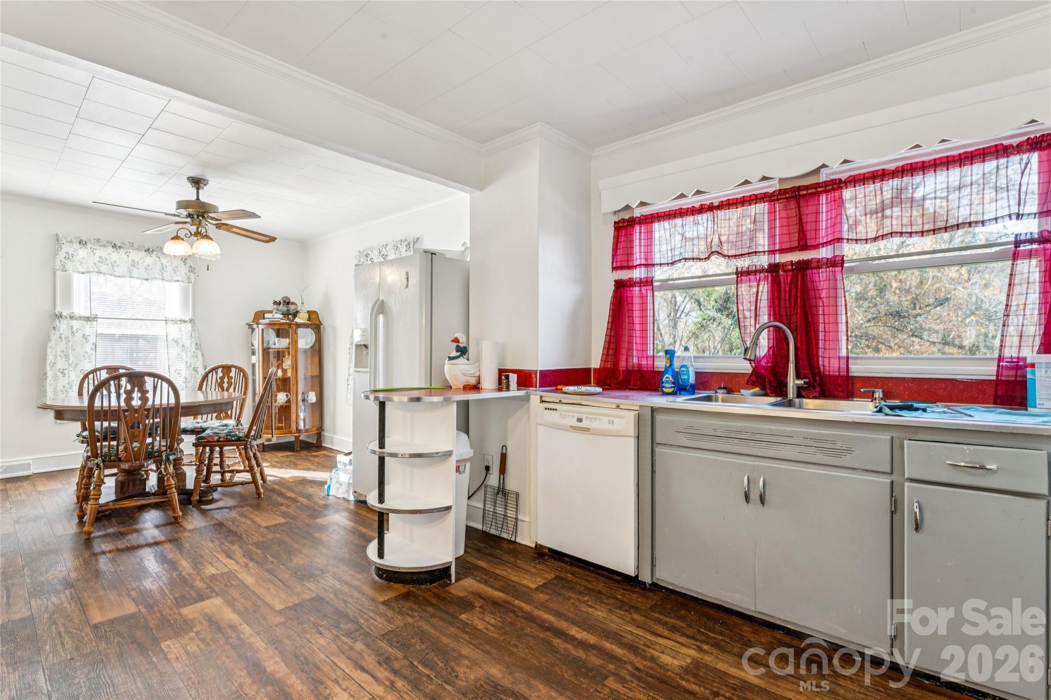 7910 Highway 90 Stony Point, NC 28678 - Photo 7 of 28 a very nice looking dining room with wooden floor and furniture
