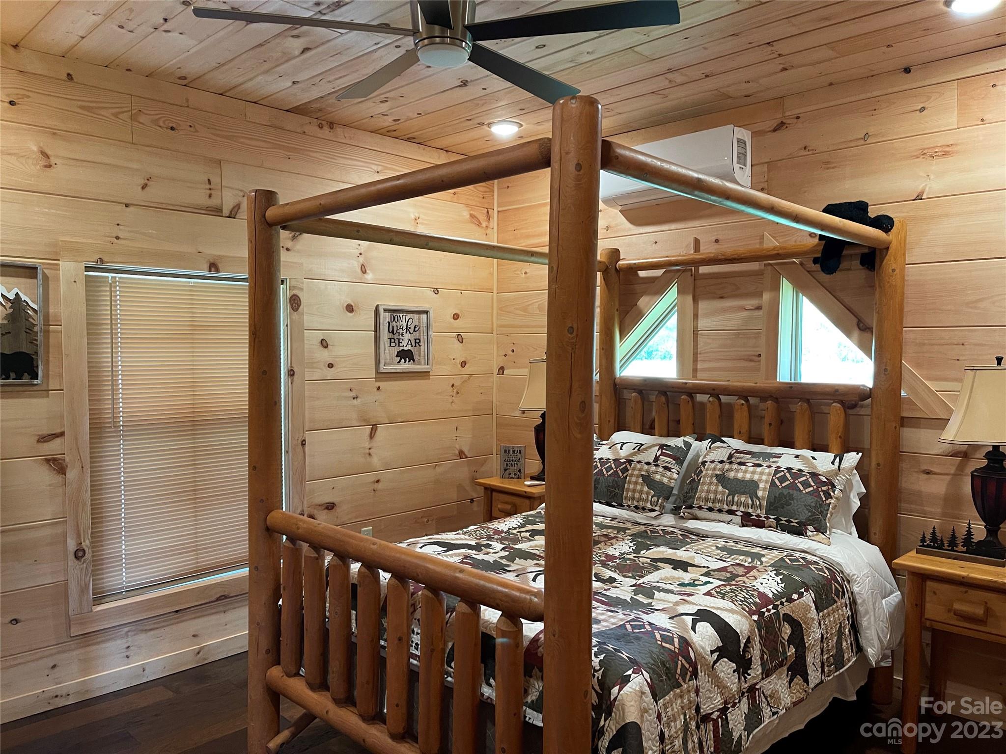 767 Scoggins Road Rutherfordton, NC 28139 - Photo 12 of 27 a bedroom with a bed a window and shower
