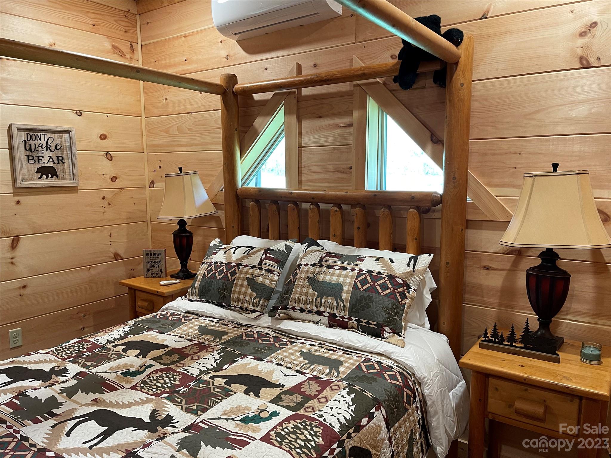 767 Scoggins Road Rutherfordton, NC 28139 - Photo 13 of 27 a bedroom with a bed and a window