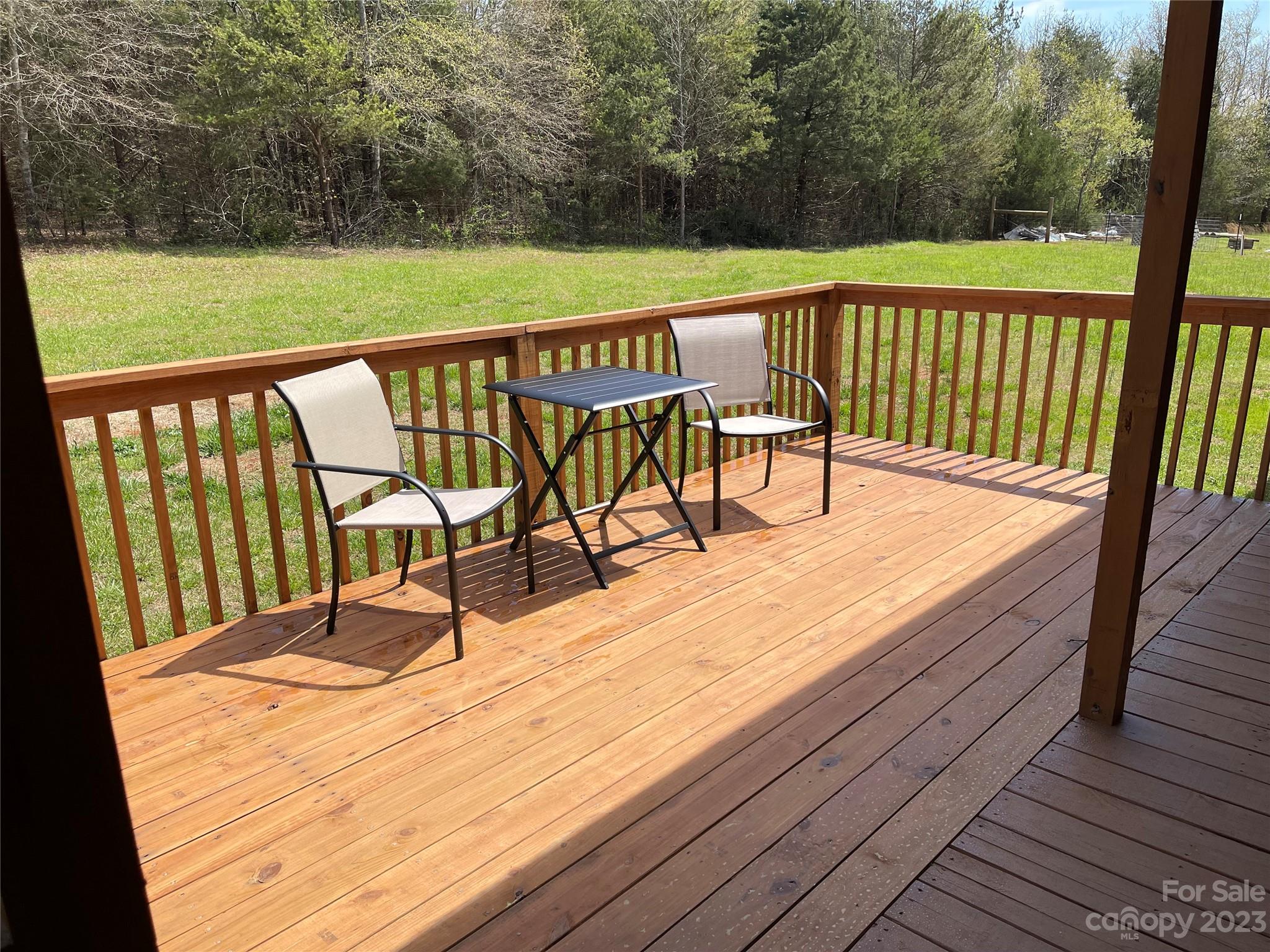 767 Scoggins Road Rutherfordton, NC 28139 - Photo 26 of 27 a view of wooden deck with a patio