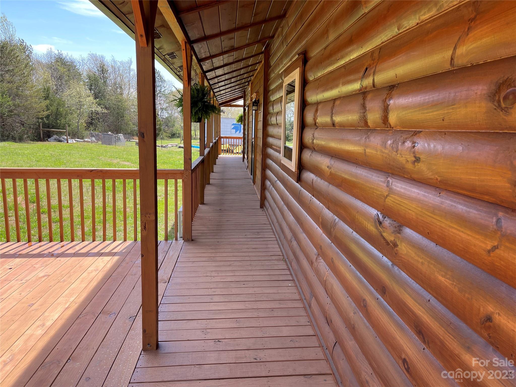 767 Scoggins Road Rutherfordton, NC 28139 - Photo 5 of 27 a view of balcony with wooden floor