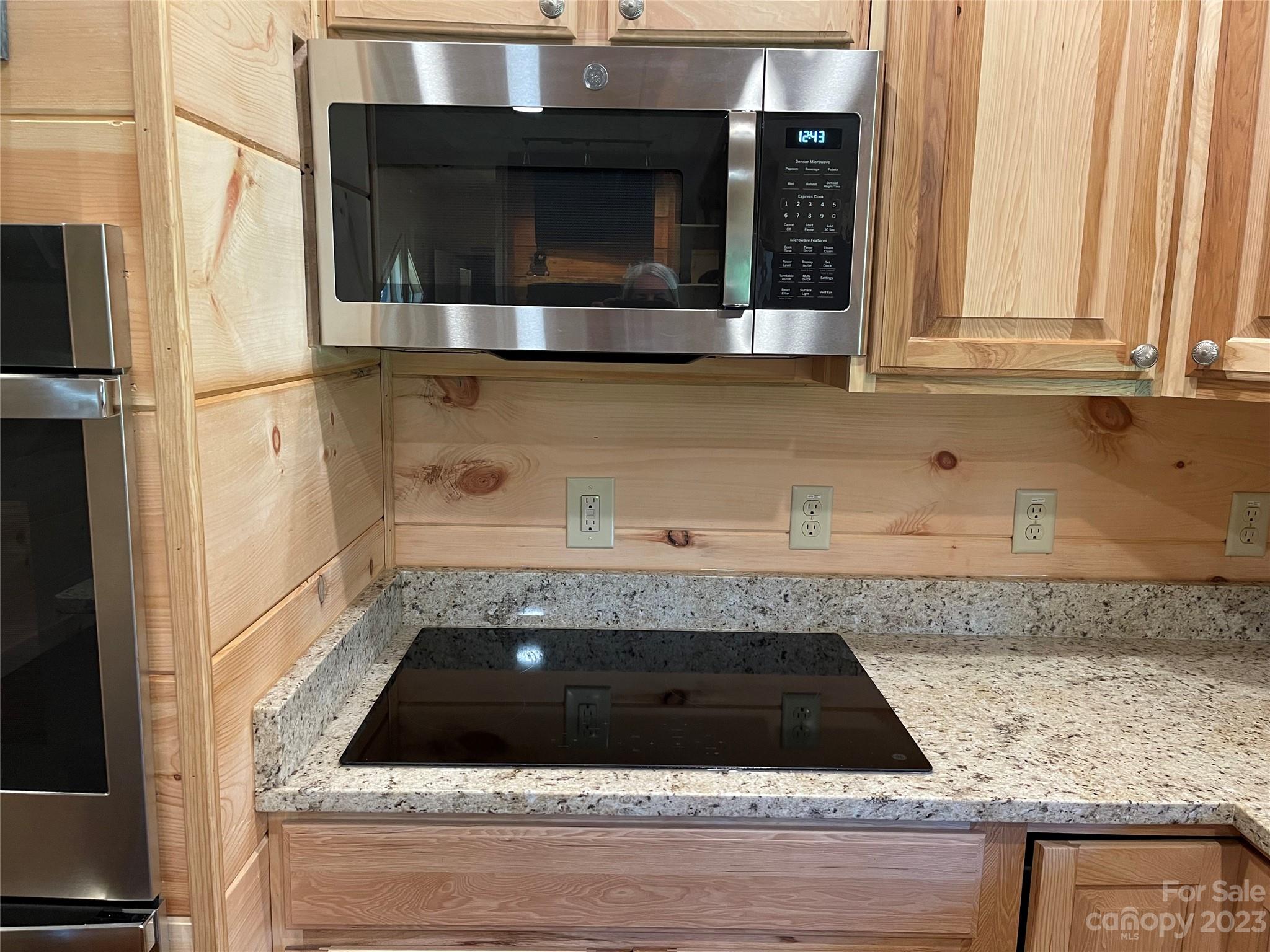 767 Scoggins Road Rutherfordton, NC 28139 - Photo 10 of 27 a kitchen with a sink and cabinets