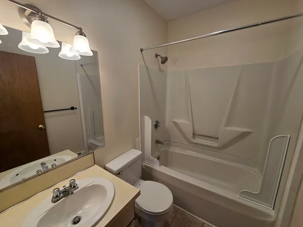 a view of staircase with rug