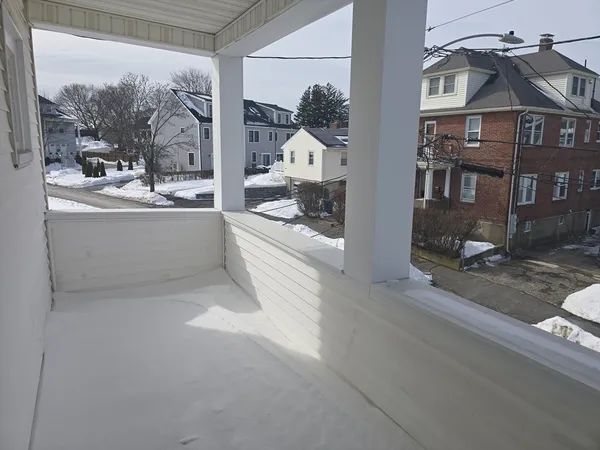 a view of a living room and bathroom